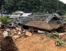 Una vivienda colapsada tras un deslave en  Ashikita, en la prefectura de  Kumamoto. AFP/JIJI PRESS
