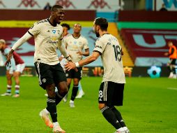 El conjunto rojo de Manchester pasó por encima del Villa y recorta puntos al Leicester City en la lucha por el cuarto lugar, después de que este no pasara del empate ante el Arsenal. AFP / A. Boyers