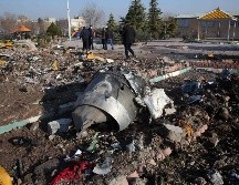 Las 176 personas que viajaban en el avión murieron en la catástrofe el 8 de enero. AFP/ARCHIVO