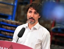 El primer ministro ofrece disculpas por no autoexcluirse de las discusiones sobre el acuerdo con  una organización de beneficencia que pagó grandes cantidades de dinero a su familia. AFP / ARCHIVO