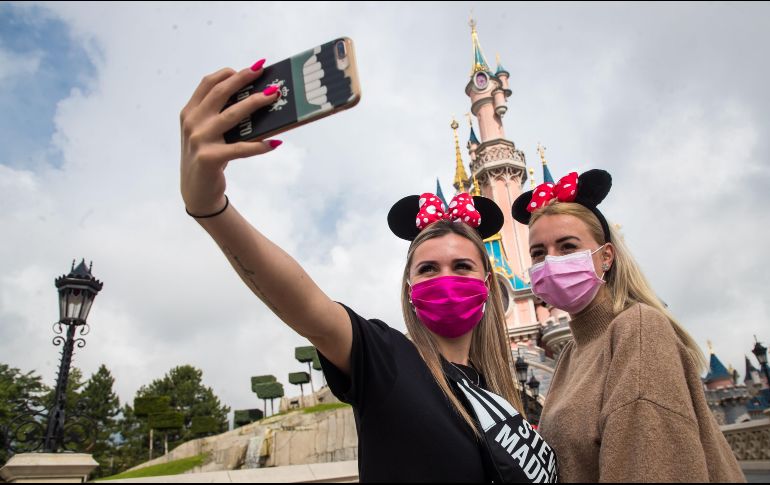 Aquellos que tengan una entrada sin fecha precisa deberán inscribirse para anunciar el día que quieren disfrutar del parque. EFE / C. Petit