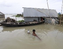 Las lluvias del monzón son esperadas cada año para reponer las reservas de agua, pero también cuestan la vida a cientos de personas. AFP / S. Kanti