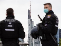 Cinco oficiales resultaron heridos en los disturbios que se iniciaron a las tres de la madrugada. AFP / ARCHIVO