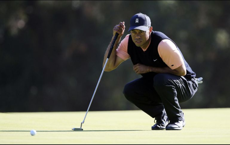 El golfista estadounidense Tiger Woods confirmó este viernes a través de sus redes sociales que no jugará el Campeonato Mundial de Golf, que se va a disputar en Memphis. AFP / ARCHIVO