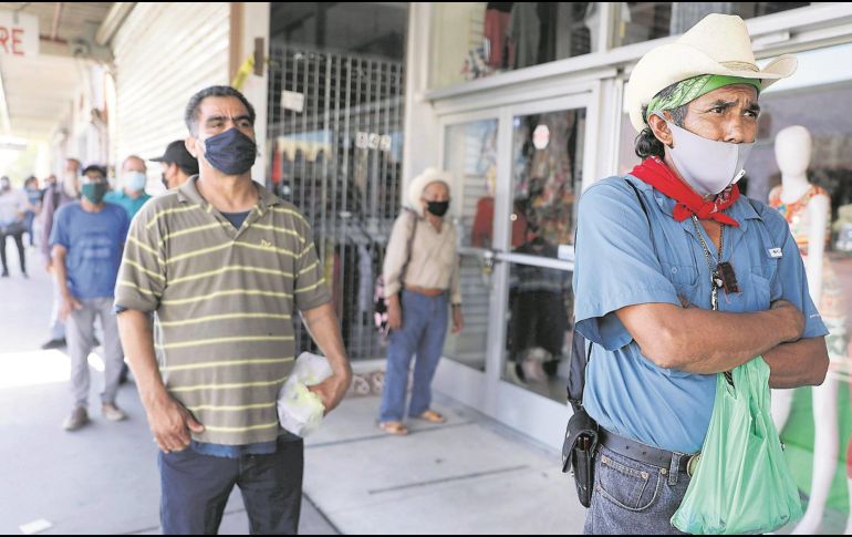 El desplome de la actividad productiva en Estados Unidos, Canadá y América Latina, ha dejado millones de desempleados. AFP