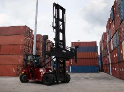 En el sexto mes del año las exportaciones totales de mercancías reportaron un alza mensual de 75.6%. AFP/ARCHIVO
