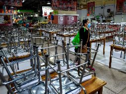 El PIB registró el impacto del cierre de negocios y la suspensión de labores llevada a cabo para evitar más contagios. AFP/ARCHIVO