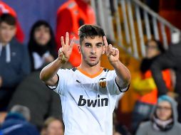 Torres debutó con el Valencia en noviembre de 2017 y desde entonces jugó 97 partidos con el equipo español, anotando nueve goles y repartiendo doce asistencias. AFP