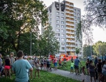 Seis personas murieron en un departamento del edificio, mientras que otras cinco fallecieron tras saltar al vacío. EFE/L. Kabon