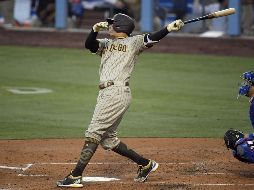 Manny Machado logró un grand slam. AFP