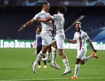 Marquinhos celebra su gol con sus compañeros. EFE/D. Ramos
