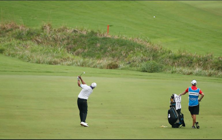 En el liderato del torneo se encuentran empatados Harold Varner III, Tom Hoge y Roger Sloan. AFP/C. Keane