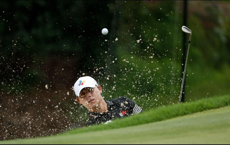 En la tercera bandera, Kim consiguió un hoyo en uno. AFP/C. Keane