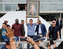El presidente, Jair Bolsonaro, se reunió recientemente en Brasilia con católicos y antiabortistas. AFP