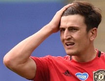 Maguire es el defensa mejor pagado del mundo, tras firmar el año pasado con el United procedente del Leicester en un acuerdo valuado en 97 MDD. AFP / ARCHIVO