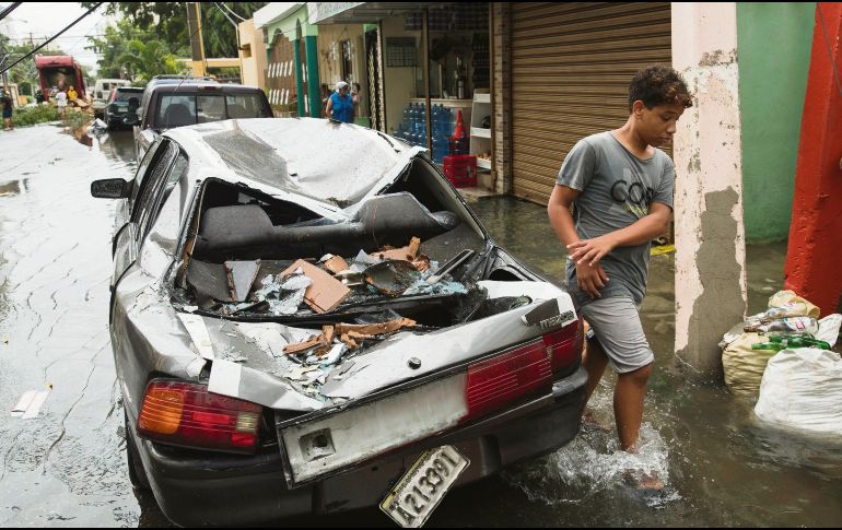 DAÑOS. “Laura” provocó tormentas en las islas caribeñas. EFE