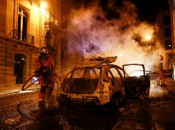 Los actos vandálicos los realizaron cerca del estadio del PSG y en la avenida de los Campos Elíseos. AFP / ARCHIVO