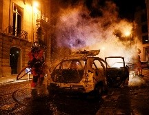 Los actos vandálicos los realizaron cerca del estadio del PSG y en la avenida de los Campos Elíseos. AFP / ARCHIVO