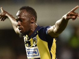 Usain Bolt se encuentra aislado en su residencia. AFP / ARCHIVO
