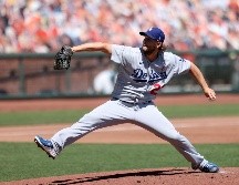 Kershaw aprovechó la ocasión para manifestar apoyo a sus compañeros de raza negra y ganó su tercera apertura consecutiva. AFP / E. Shaw