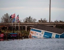 La tormenta categoría 4 golpeó la costa estadounidense del Golfo de México, mató por lo menos a 14 personas y provocó caos debido a los fuertes vientos e inundaciones. AFP / A. Caballero-Reynolds