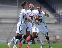 Bryan Mendoza (c) festeja su gol contra Tijuana en el estadio Olímpico Universitario de Ciudad de México. AFP/R. Vázquez