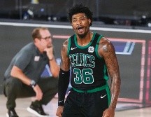 PUNTERÍA. Marcus Smart embocó cinco triples en el último cuarto para llevar a los Celtics a la victoria. AP• M. Terrill