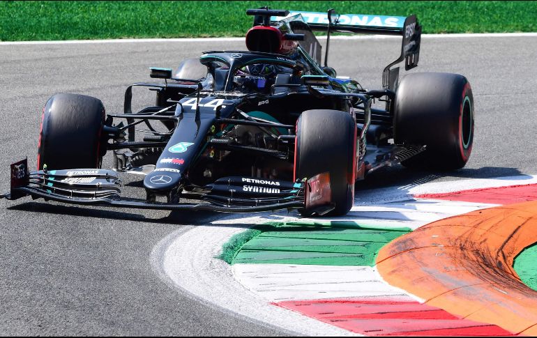 El seis veces campeón del mundo consiguió de paso la vuelta rápida del veloz circuito italiano y sumó este sábado su ''pole'' número 94, la séptima en Monza. AFP / J. Lorenzini