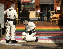 Forenses trabajan en la zona de una de las agresiones en Birmingham. AFP/O. Scarff