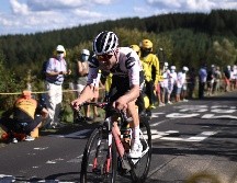El suizo culmina una audaz fuga en un ascenso que nunca había sido recorrido y se muestra como una promisoria figura del ciclismo. AFP / M. Bertorello