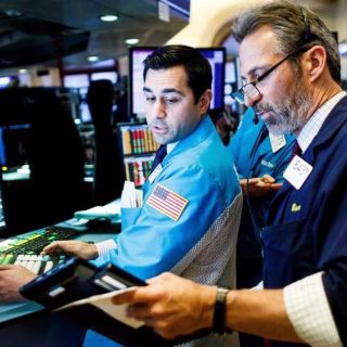 Wall Street cierra con resultados dispersos tras reunión de la Fed