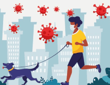 Los expertos consideran que salir a correr acompañado o pasear al perro tiene un riesgo moderado-bajo. GETTY IMAGES | BBC