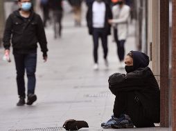 Las solicitudes de subsidio alcanzaron el récord de 6.8 millones en la última semana de marzo. AFP/W. West