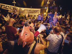 Renuncia. Los israelíes se saltan las medidas sanitarias para pedir la salida de Benjamin Netanyahu. AP