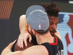 FIGURAS. Jimmy Butler (izq.) y Goran Dragic han sido artífices del éxito de Miami. AFP • K. Cox