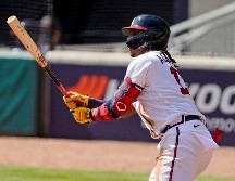 Ronald Acuña Jr. Estuvo oportuno con tres hits. AP/R. Cashaw
