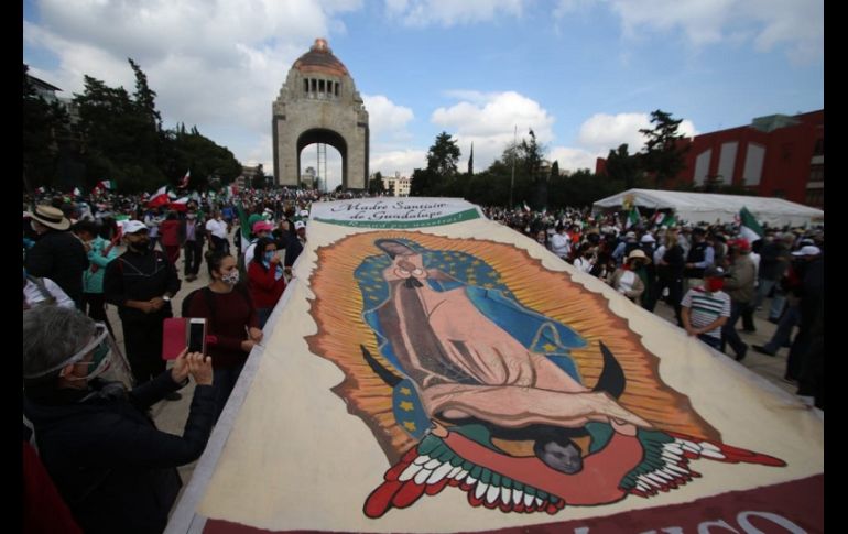 Elementos de la Secretaría de Seguridad Ciudadana vigilan el desarrollo de la marcha. SUN/C. Mejía