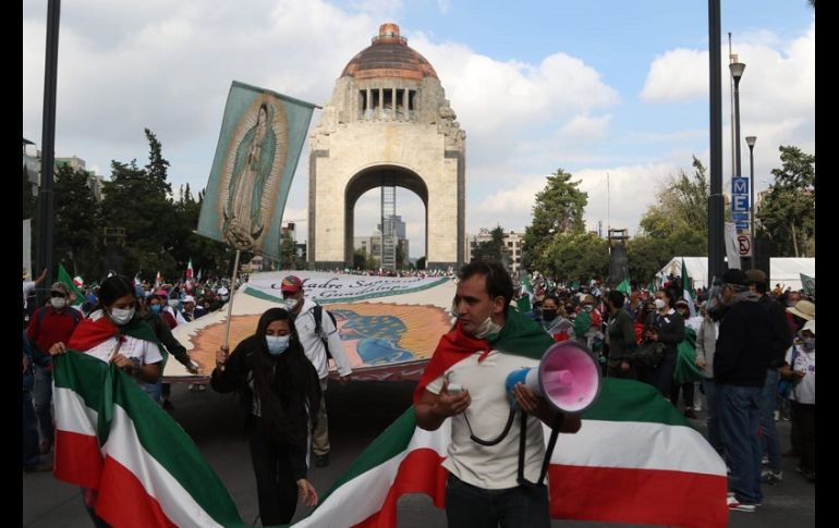 Elementos de la Secretaría de Seguridad Ciudadana vigilan el desarrollo de la marcha. SUN/C. Mejía