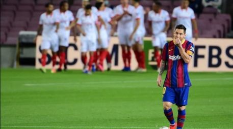 Messi colaboró en el gol de Coutinho para el empate, pero no fue suficiente para sacar el triunfo ante el Sevilla. AFP / L. Gene