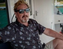 McAfee tiene 75 años. Fue arrestado en Barcelona mientras intentaba viajar a Estambul. AFP