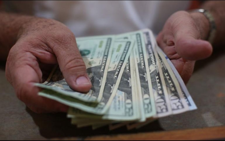 En la sesión del lunes, el dólar finalizó en menos de 22 pesos por primera vez en dos semanas. EL INFORMADOR/ARCHIVO