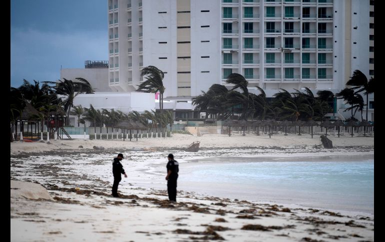 Una playa en Cancún. AFP/P. Pardo