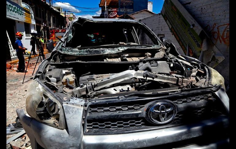 Agentes de tránsito cerraron varias calles mientras duró el trabajo de las autoridades. AFP/C. Vega