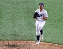 Anoche, Julio Urías (foto) y Víctor González brillaron con los Dodgers, quienes vencieron a Rays de Tampa Bay en seis juegos. AFP / S. M. Haffey
