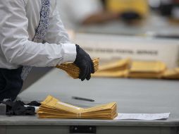 En parte, el retraso en Michigan se debe a que las localidades con más de 25 mil habitantes tuvieron que esperar hasta el 2 de noviembre para comenzar a procesar las papeletas anticipadas. AFP / Getty Images / E. Cromie