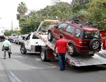 Señalan que de aproximadamente 500 grúas que dan servicio en la ZMG, sólo cerca de 200 tienen permisos en regla. EL INFORMADOR/ARCHIVO
