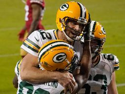Aaron Rodgers lanzó para más de 300 yardas para guiar a los suyos a su sexto triunfo. AP/T. Avelar