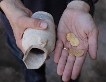 Las monedas fueron descubiertas en una excavación cercana al Muro de los Lamentos. EFE . A / Sultan