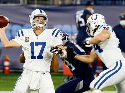 Philip Rivers. El quarterback de los Titans lanzó para 308 yardas con un envío a las diagonales. AFP
