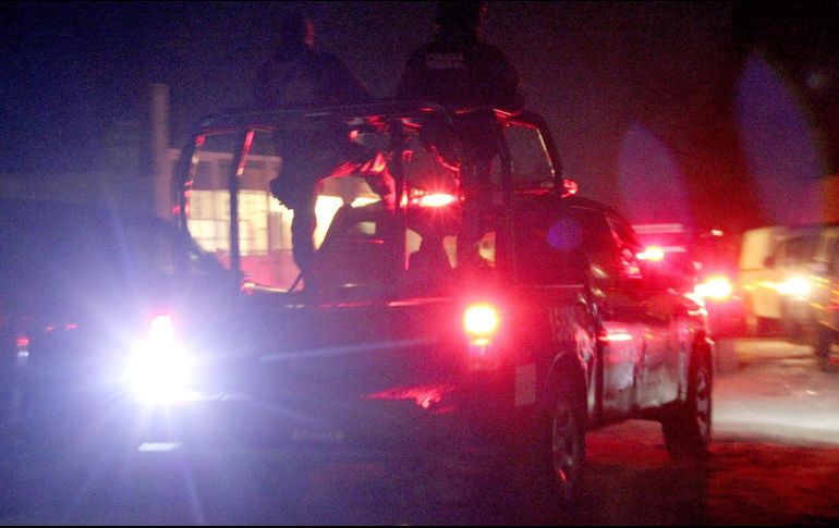 Decenas de elementos de la Policía Municipal, GN y del Ejército se desplegaron en ambos puntos para la preservación de las escenas del crimen. AFP / ARCHIVO